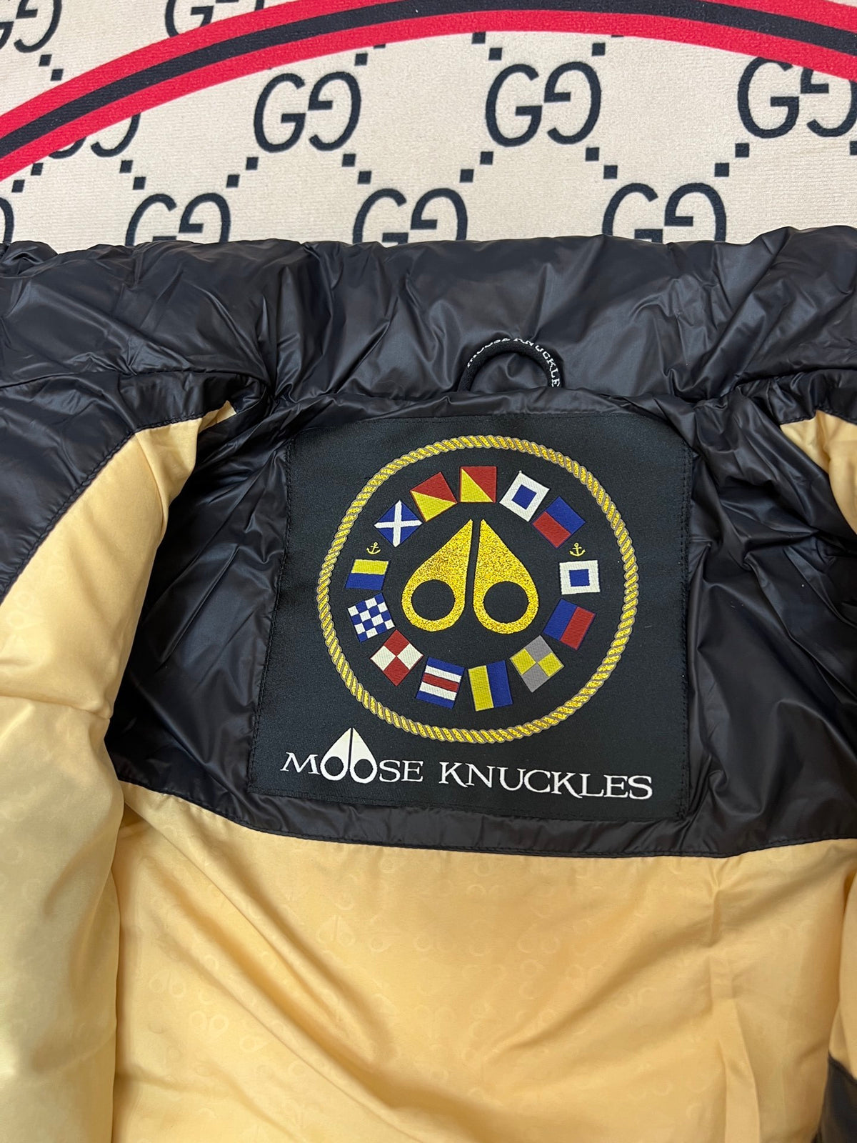 Moose Knuckles Black Stirling Down Jacket – Premium Glossy Shell Wide-Baffle Stand Collar Gold Zip with Tonal MK Arm Badge