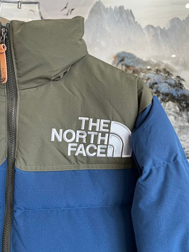 The North Face Ocean Blue and Military Olive 1996 Retro Nuptse Down Jacket – 700-Fill Wide-Baffle Two-Tone Stand Collar Orange Zip No Hood