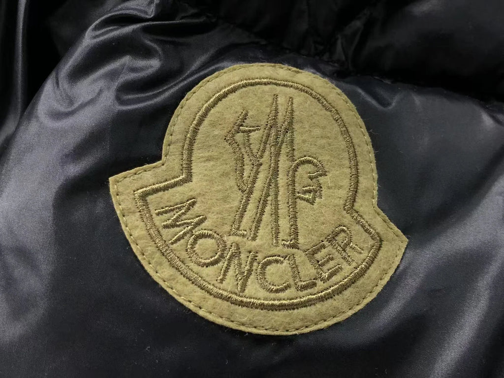 Moncler Black Glossy Stand Collar Down Jacket – Oversized Gold Suede Arm Badge