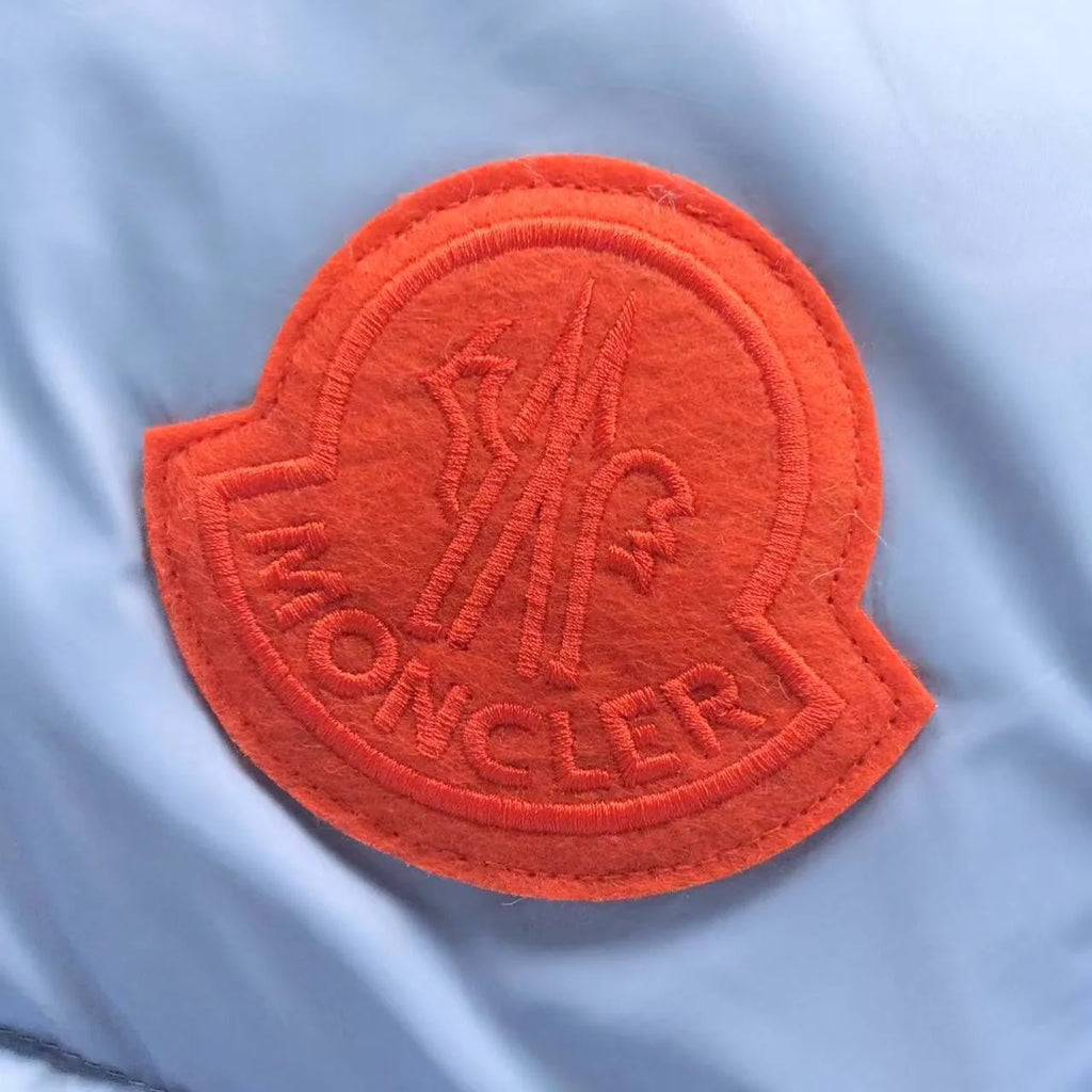 Moncler Ice Blue Hooded Puffer Jacket with Orange Logo Patch