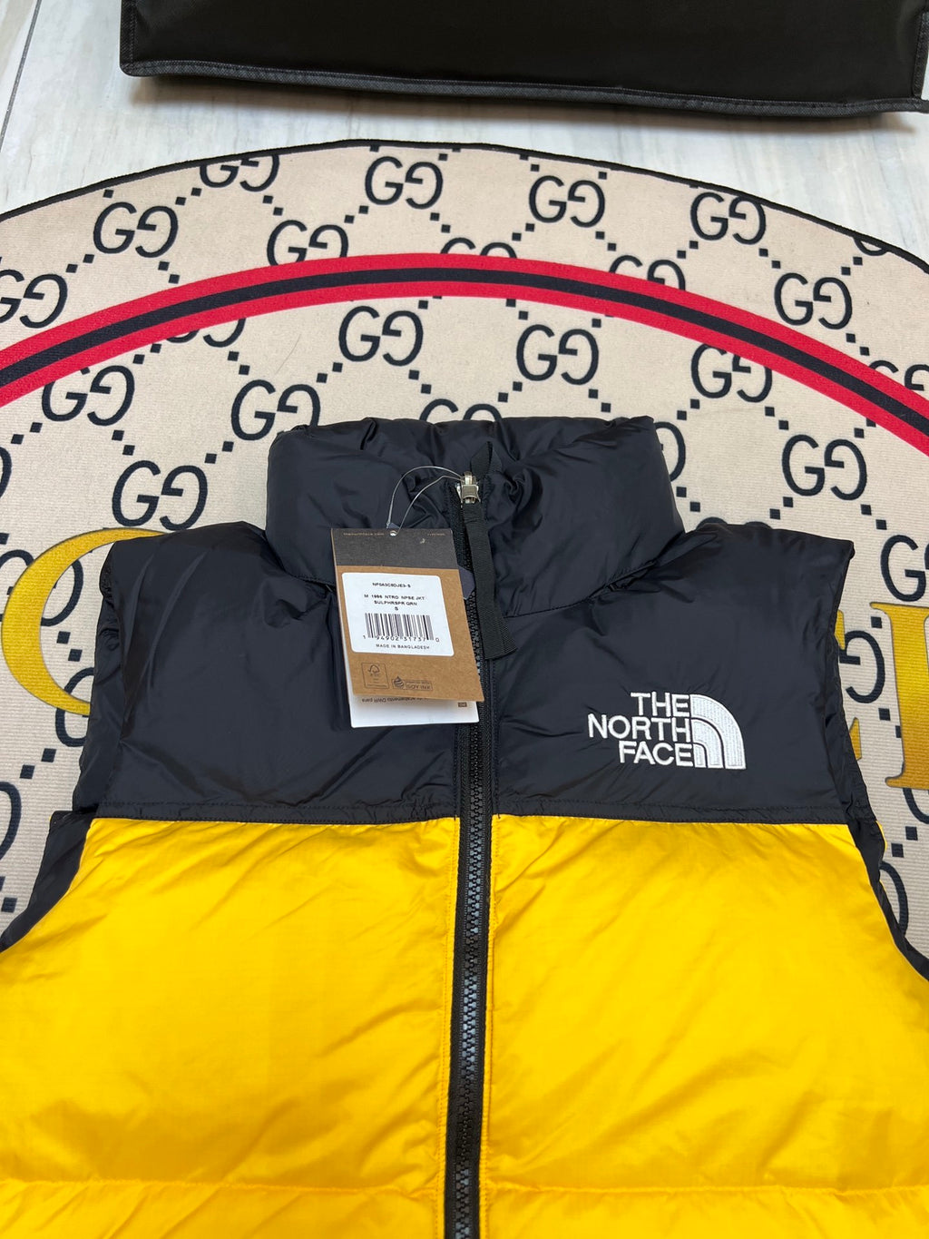 The North Face Yellow & Black Nuptse Down Vest